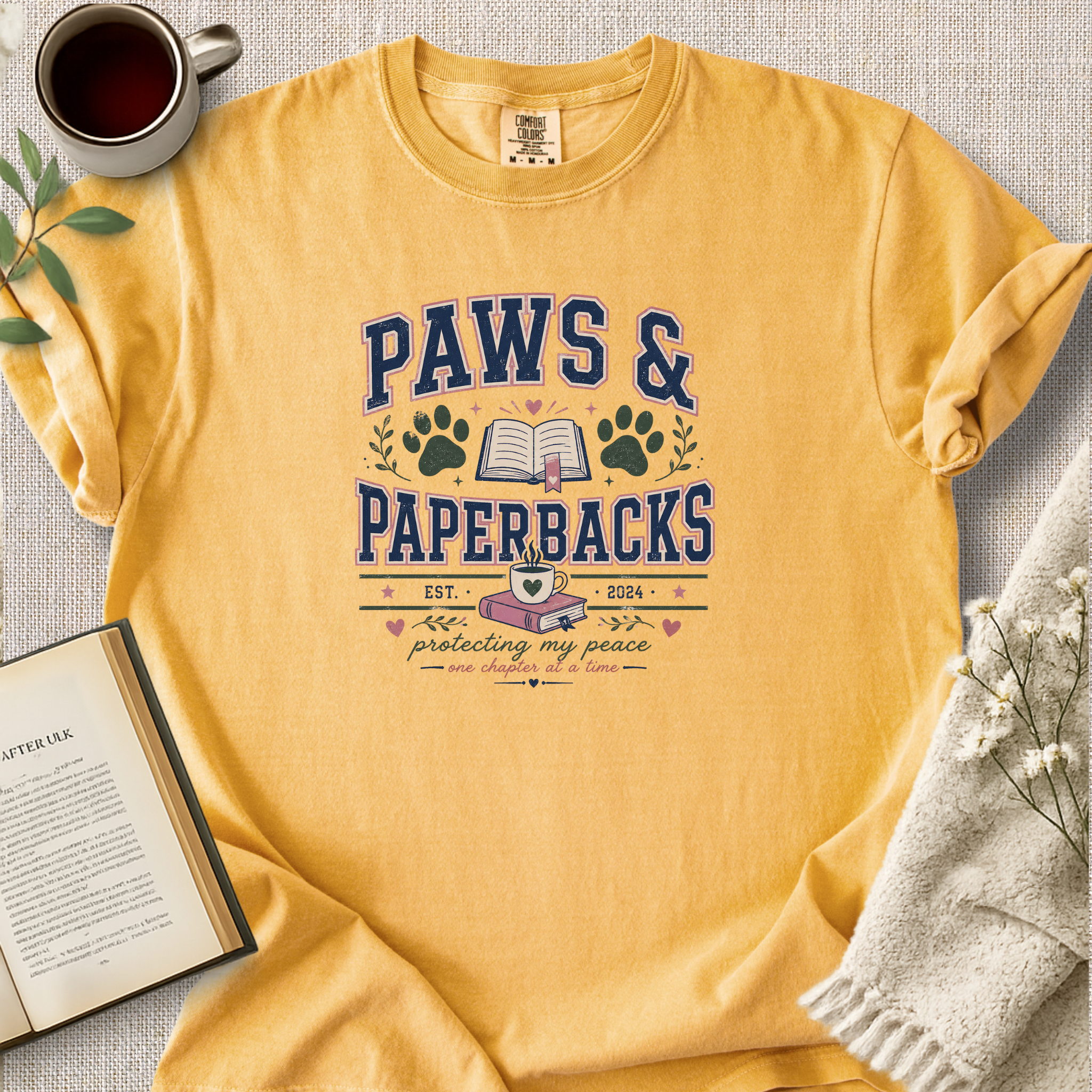 "Paws And Paperbacks" Cozy Reading Tee