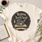 "Reading Keeps Reality Away" Cozy Tee