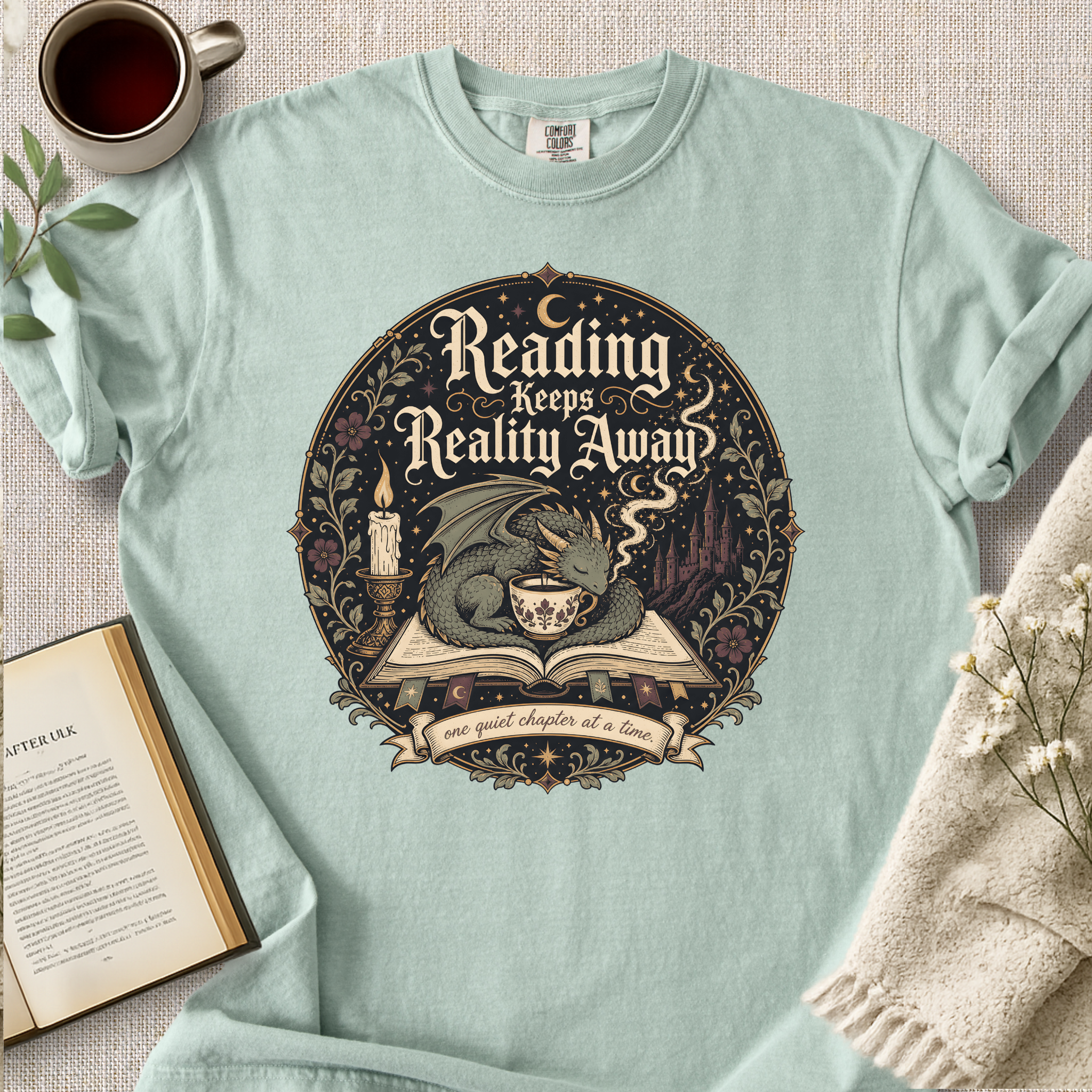 "Reading Keeps Reality Away" Cozy Tee