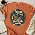 "Reading Keeps Reality Away" Cozy Tee