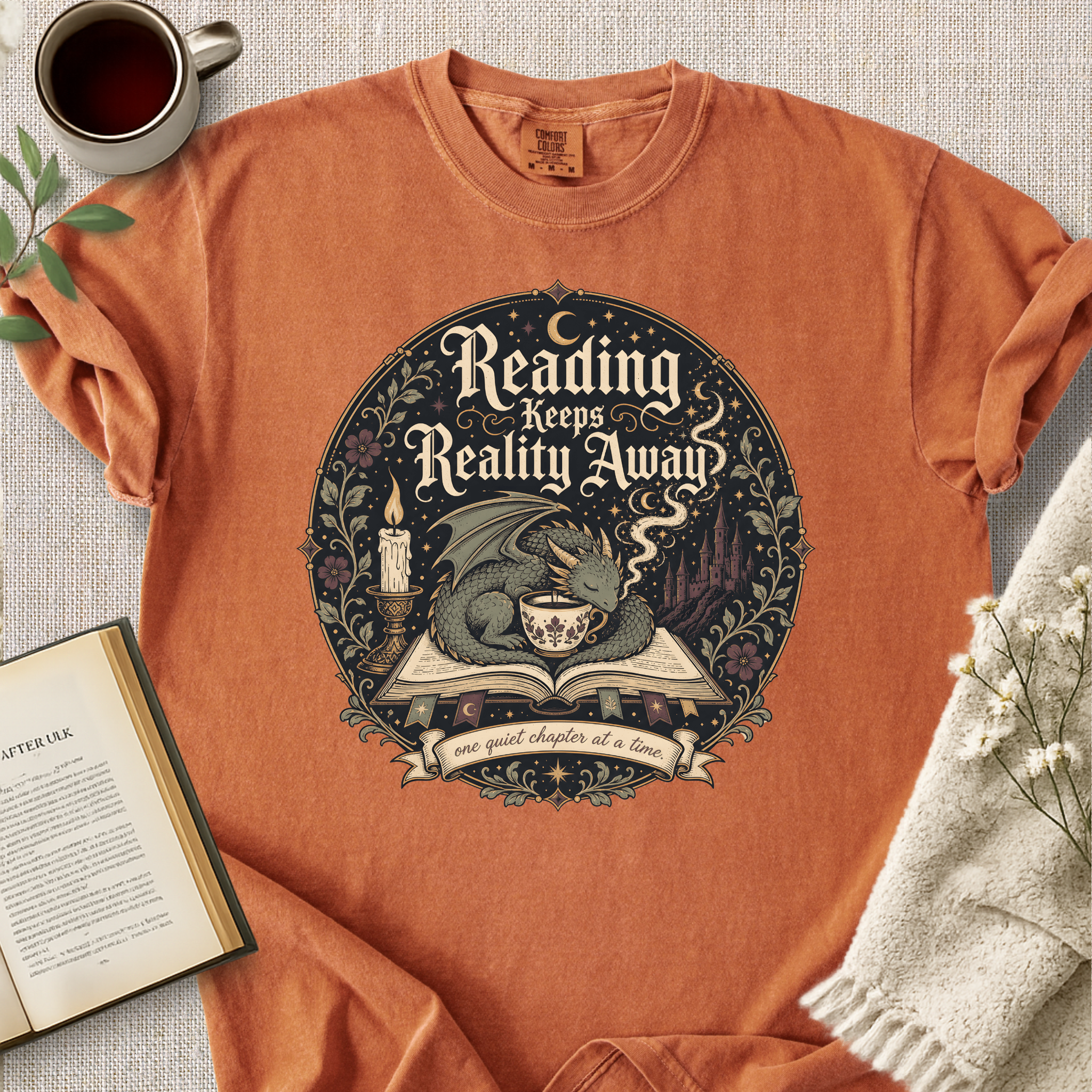 "Reading Keeps Reality Away" Cozy Tee