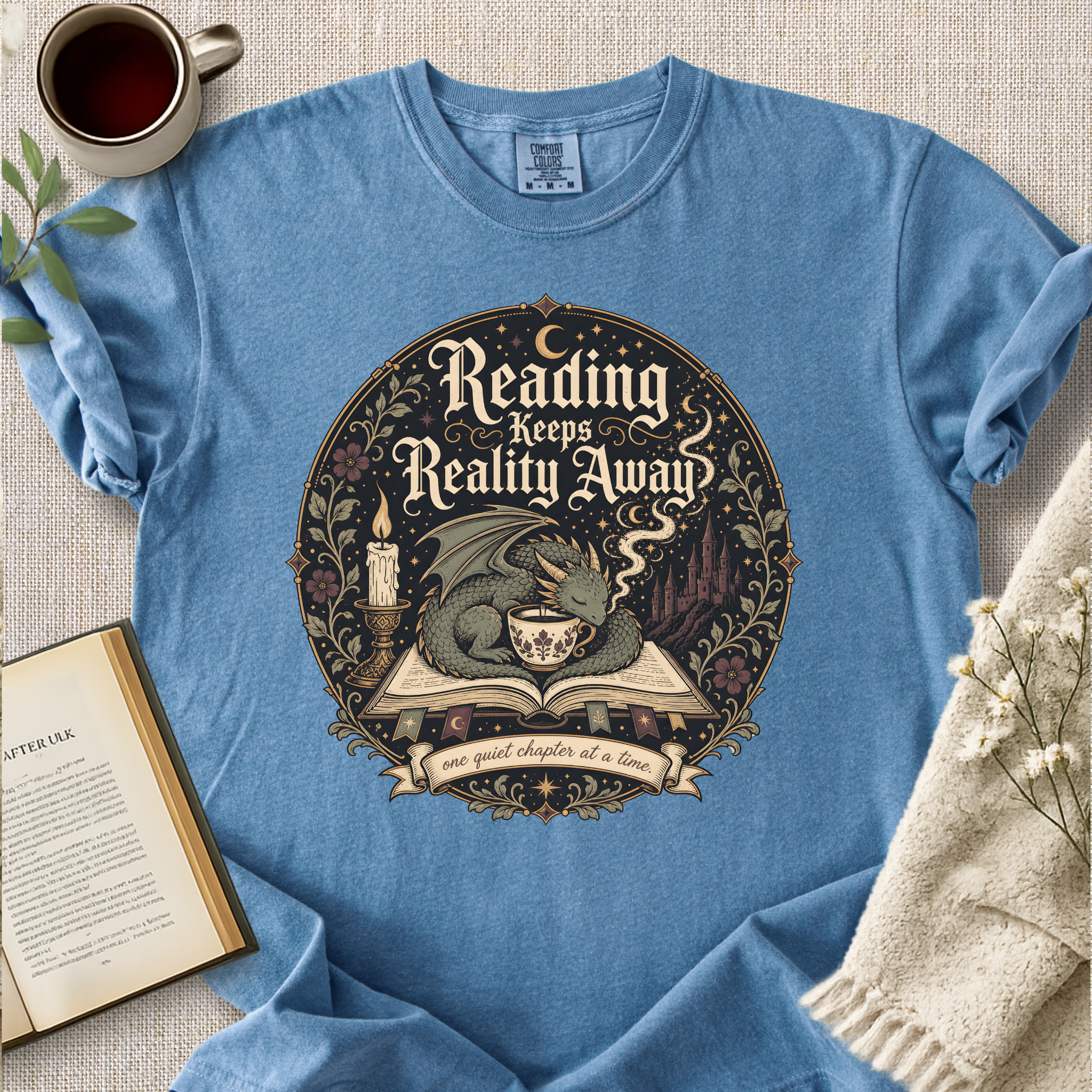 "Reading Keeps Reality Away" Cozy Tee