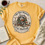 "Do Not Disturb, I'm Shelved" Cozy Tee