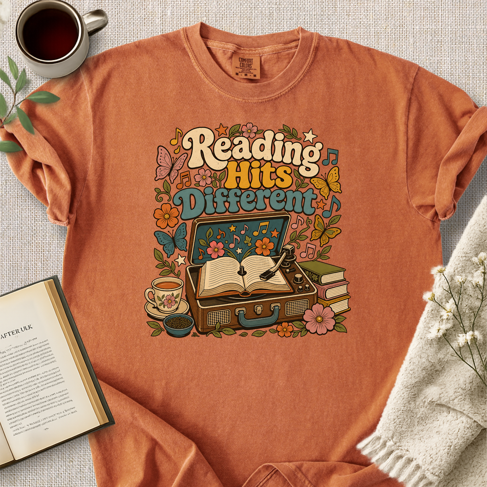 "Reading Hits Different" Cozy Tee
