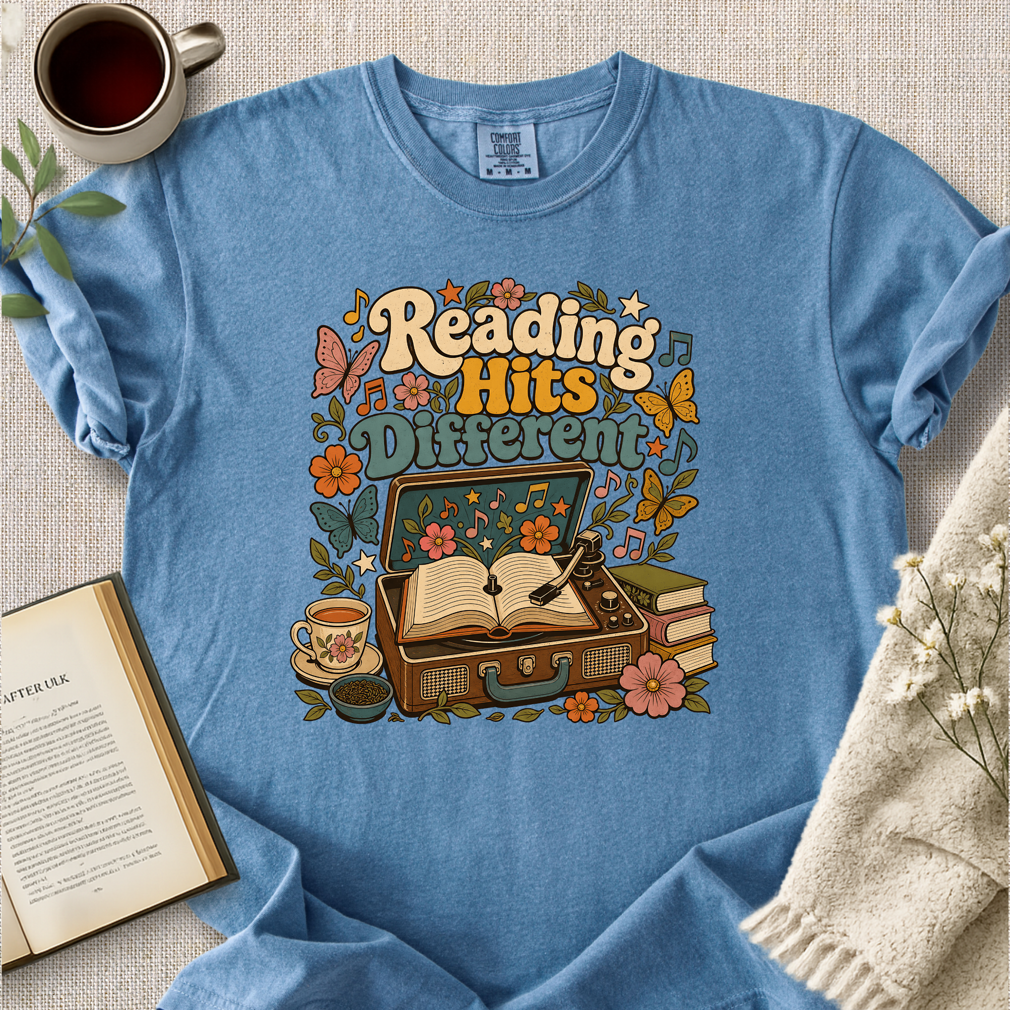 "Reading Hits Different" Cozy Tee