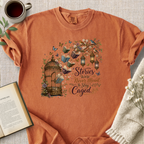 "Stories Were Never Meant To Stay Caged" Cozy Tee