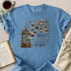 "Stories Were Never Meant To Stay Caged" Cozy Tee